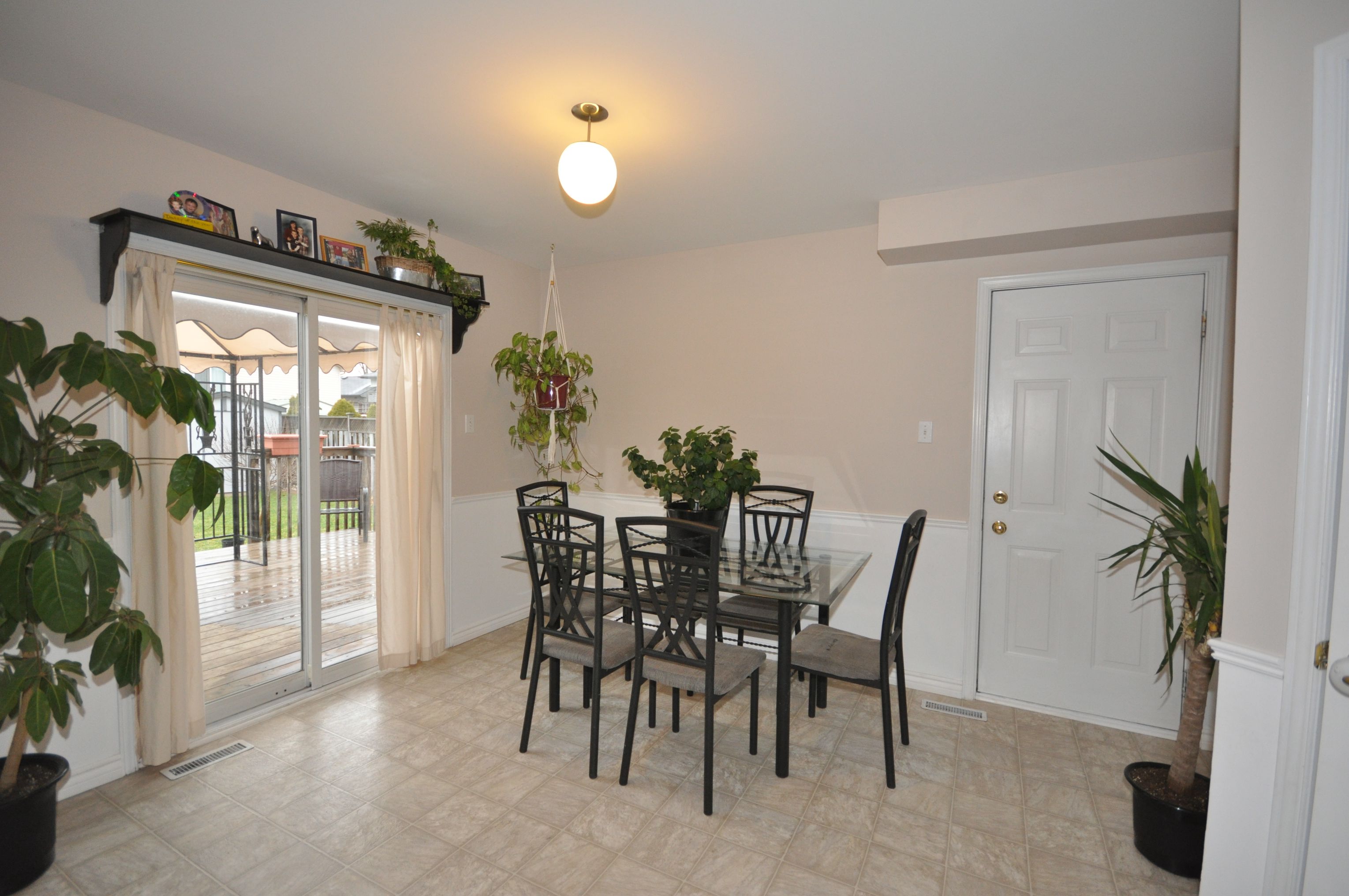 Spacious eating area with patio doors to sundeck