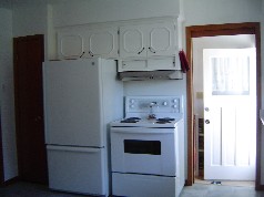 The cupboards have all been painted white and its eat in size! 