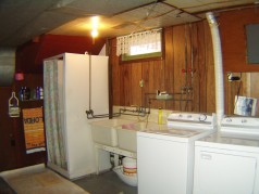 Finished laundry area in the lower level 
