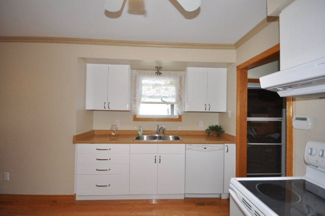 New white kitchen with ample drawer & counter space