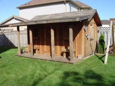 Cabin style shed with a 60 amp service for future pool 