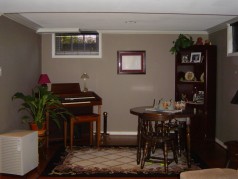Formerly a lower level bedroom, this area is now open to the family room and makes a great card room or place for the kids toys. 