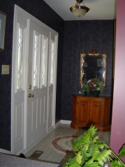 Front foyer with newer door with sidelites 