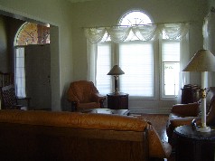 Living and Dining Room have large sunny windows, upgraded trim & mouldings 