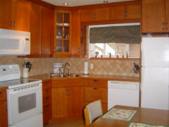  New maple kitchen with luncheon bar and room for 2 to dine